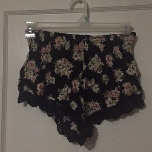 Black flora print shorts